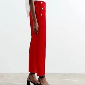 RED STRAIGHT LEG PANTS WITH GOLD EMBELLISHED BUTTONS / Color: Red | Size: M